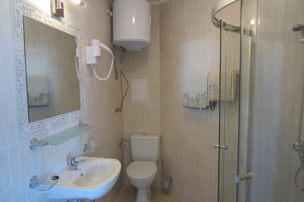 Deluxe Two-Bedroom Apartment with Balcony and Partial Sea View